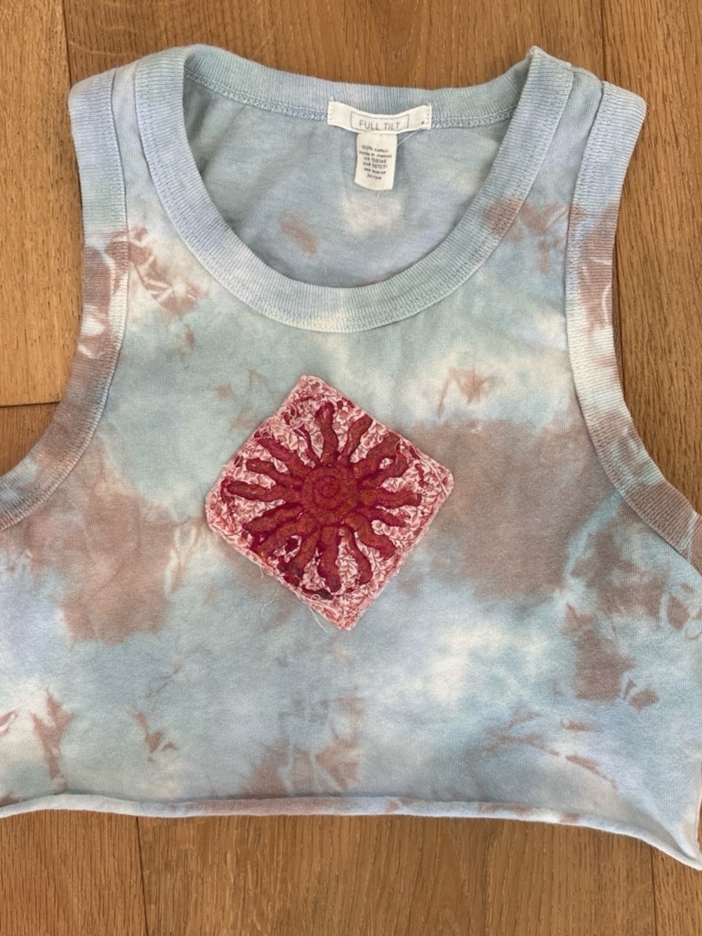 Tie dye cropped tank with handmade sunburst patch